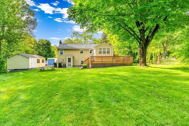 2 Walker St, Norton, MA 02766 - back of house with a wooden deck, a chimney, and a lawn