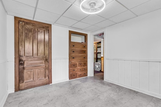 2 Walker St, Norton, MA 02766 - empty room with a wainscoted wall and a drop ceiling