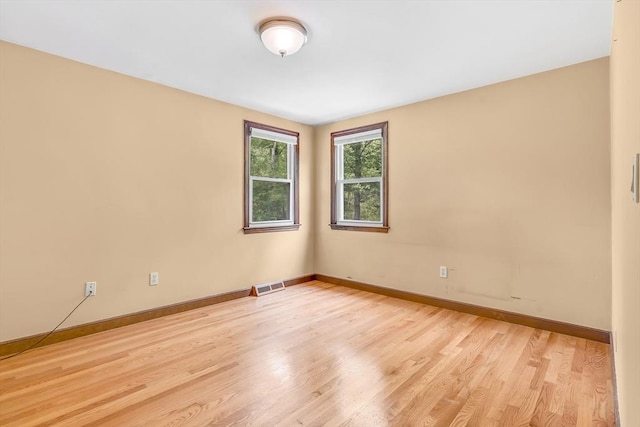 2 Walker St, Norton, MA 02766 - spare room with baseboards and light wood finished floors