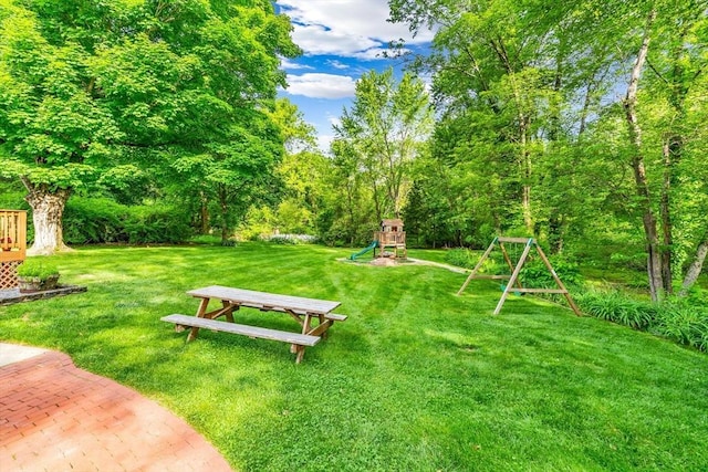 2 Walker St, Norton, MA 02766 - view of grassy yard featuring a playground