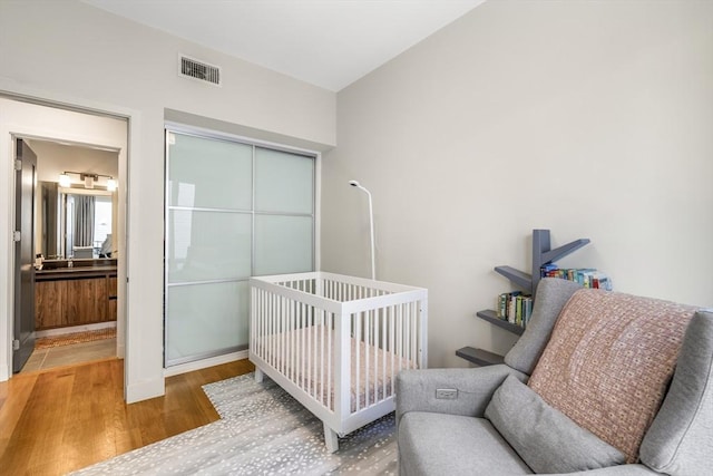 531-533 E 2nd St Unit 202, Boston, MA 02127 - bedroom with wood finished floors, a closet, and baseboards