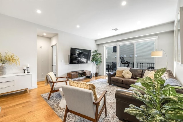 531-533 E 2nd St Unit 202, Boston, MA 02127 - living area with light wood-style flooring, recessed lighting, and baseboards