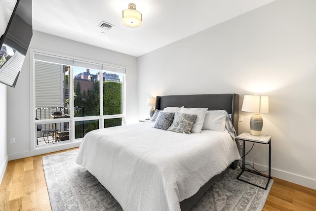531-533 E 2nd St Unit 202, Boston, MA 02127 - bedroom featuring baseboards and wood finished floors