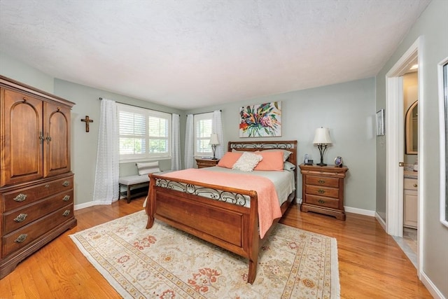 19 Longwood Rd Unit 243, Mashpee, MA 02649 - bedroom with light wood-style floors and baseboards