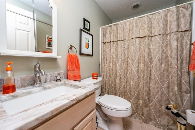 19 Longwood Rd Unit 243, Mashpee, MA 02649 - full bathroom featuring vanity, toilet, tile patterned floors, and a shower with curtain