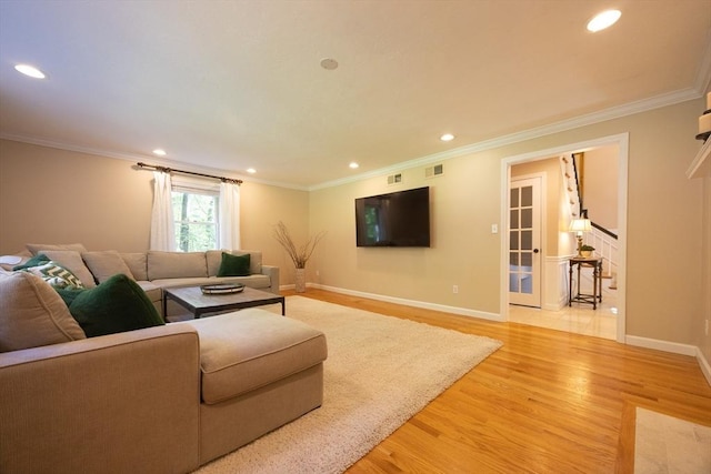 13 Valleywood Rd, Hopkinton, MA 01748 - living area with light wood-type flooring, recessed lighting, crown molding, and baseboards