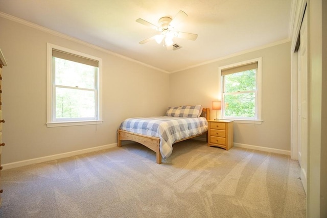 13 Valleywood Rd, Hopkinton, MA 01748 - bedroom with baseboards, light carpet, multiple windows, ornamental molding, and ceiling fan