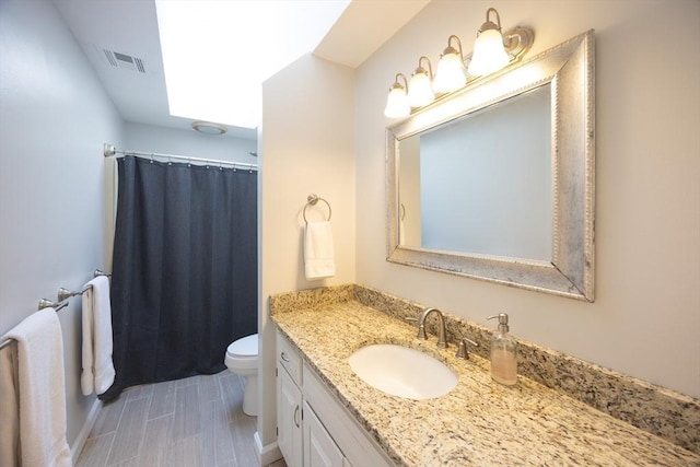 13 Valleywood Rd, Hopkinton, MA 01748 - full bathroom featuring toilet, vanity, and curtained shower