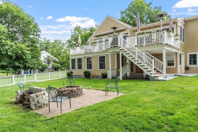 9 New Meadow Rd, Lynnfield, MA 01940 - back of property featuring an outdoor fire pit, stairs, a deck, and a patio
