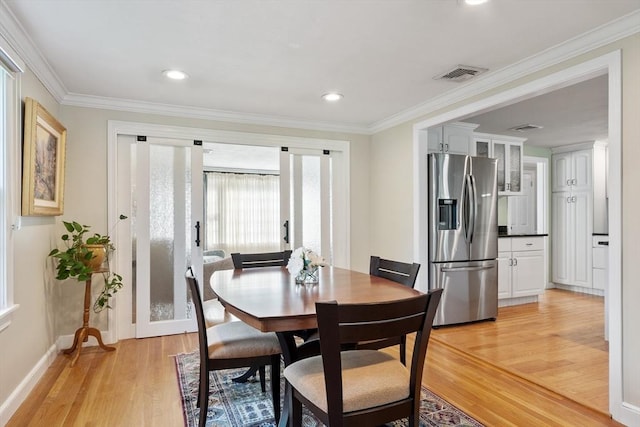 9 New Meadow Rd, Lynnfield, MA 01940 - dining space with light wood-type flooring, ornamental molding, and recessed lighting
