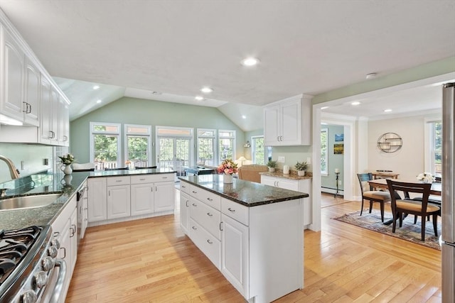 9 New Meadow Rd, Lynnfield, MA 01940 - kitchen featuring light wood-style flooring, stainless steel gas stove, a baseboard heating unit, white cabinets, and recessed lighting