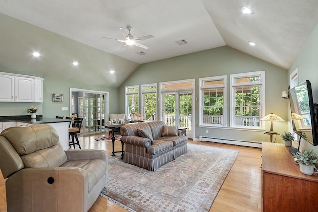 9 New Meadow Rd, Lynnfield, MA 01940 - living area featuring baseboard heating, lofted ceiling, a ceiling fan, light wood-style flooring, and recessed lighting
