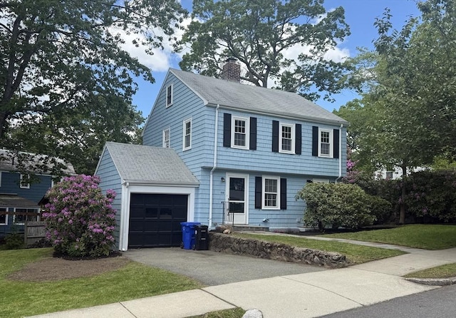 159 Payson Rd, Brookline, MA 02467 - colonial inspired home with a chimney, driveway, a garage, a front yard, and roof with shingles