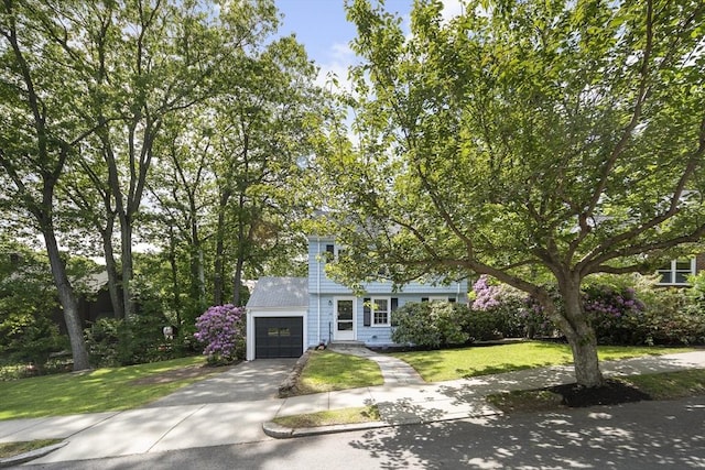 159 Payson Rd, Brookline, MA 02467 - view of front of home featuring driveway, a garage, and a front yard