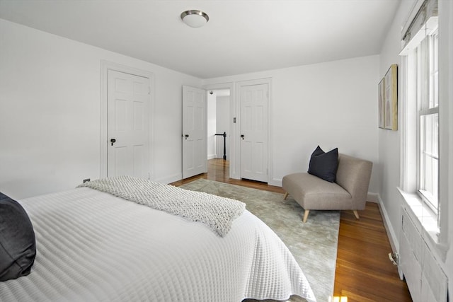 159 Payson Rd, Brookline, MA 02467 - bedroom with wood finished floors and baseboards