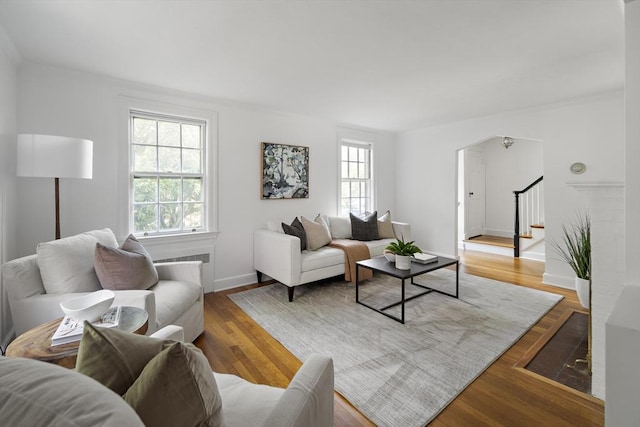 159 Payson Rd, Brookline, MA 02467 - living area with stairway, baseboards, and wood finished floors