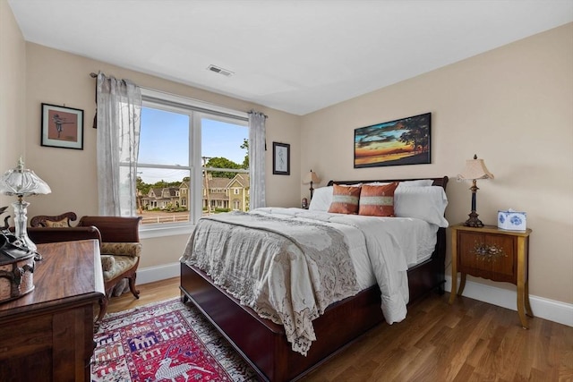 1488 Washington St Unit 1488, Newton, MA 02465 - bedroom featuring baseboards and wood finished floors