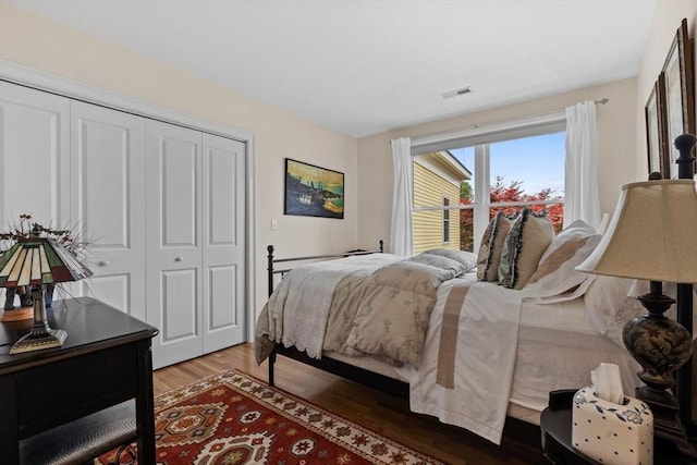 1488 Washington St Unit 1488, Newton, MA 02465 - bedroom featuring wood finished floors and a closet