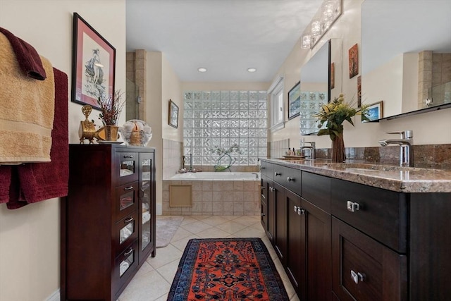 1488 Washington St Unit 1488, Newton, MA 02465 - bathroom with vanity, a bath, tile patterned flooring, and recessed lighting