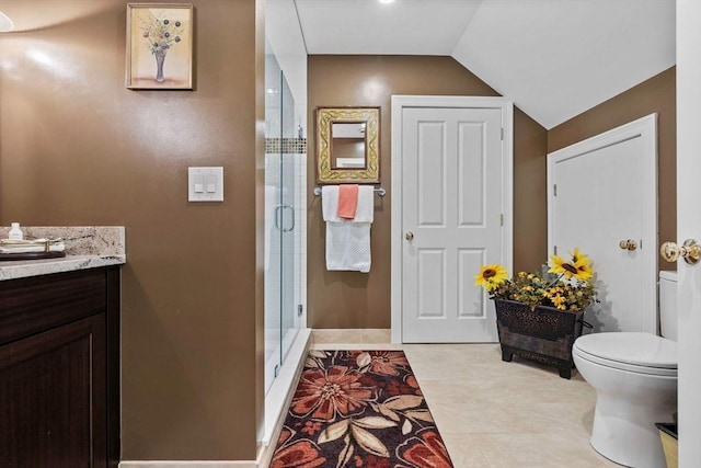 1488 Washington St Unit 1488, Newton, MA 02465 - full bathroom featuring toilet, vanity, a shower stall, vaulted ceiling, and baseboards