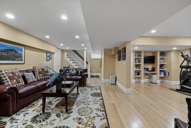 1488 Washington St Unit 1488, Newton, MA 02465 - living room with baseboards, light wood-style floors, stairs, and recessed lighting