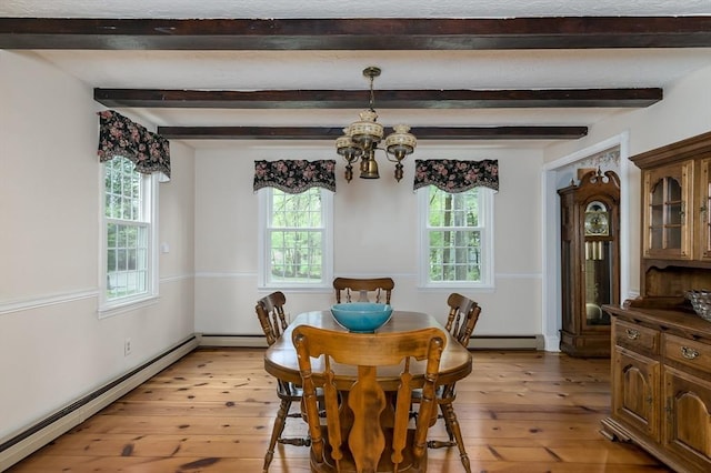 dining space with a chandelier, light wood-style flooring, a baseboard radiator, a baseboard heating unit, and beam ceiling