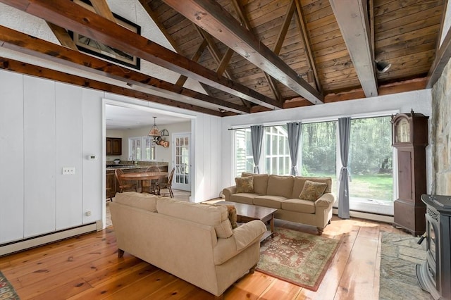 living room featuring light wood finished floors, wooden ceiling, baseboard heating, and a chandelier
