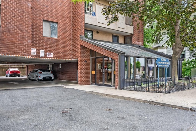 39 Parlin St Unit 503, Everett, MA 02149 - view of building exterior with covered parking