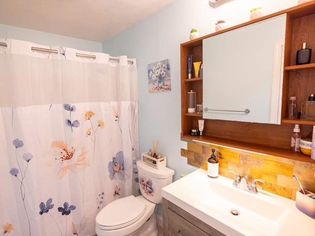 382 Great Rd Unit B 203, Acton, MA 01720 - bathroom featuring toilet, vanity, and curtained shower
