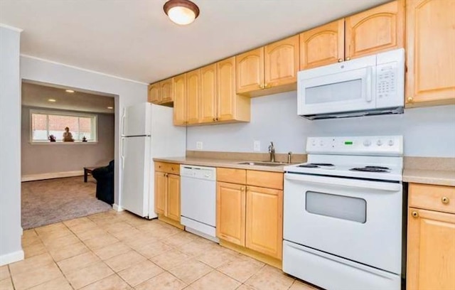 64 Bryon Rd Unit 1, Boston, MA 02467 - kitchen with white appliances, light brown cabinetry, light countertops, light colored carpet, and light tile patterned floors