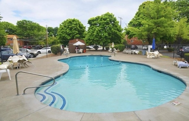 64 Bryon Rd Unit 1, Boston, MA 02467 - community pool with a patio area