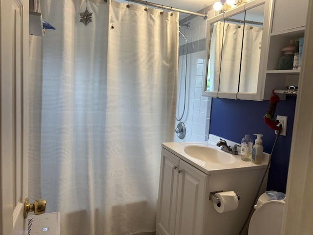 64 Bryon Rd Unit 1, Boston, MA 02467 - bathroom with vanity and a shower with shower curtain
