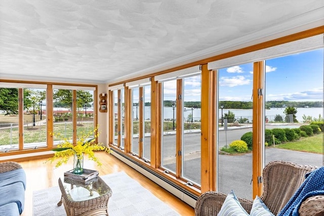 5 S Blvd, Wareham, MA 02558 - sunroom with crown molding, baseboard heating, a water view, and wood finished floors