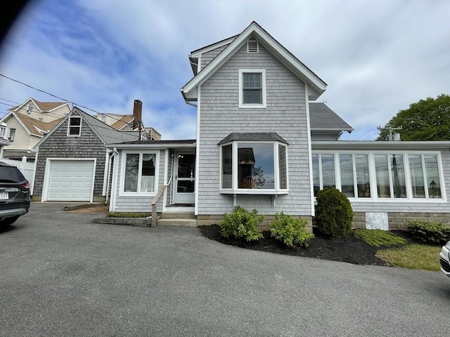 5 S Blvd, Wareham, MA 02558 - view of front facade with asphalt driveway and an attached garage