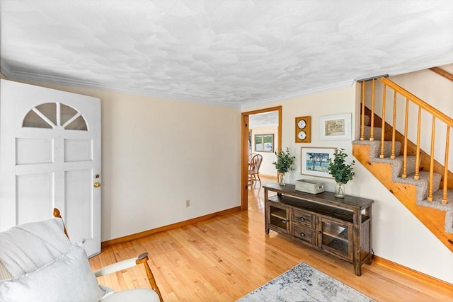 5 S Blvd, Wareham, MA 02558 - living area with light wood-style floors, stairs, baseboards, and ornamental molding