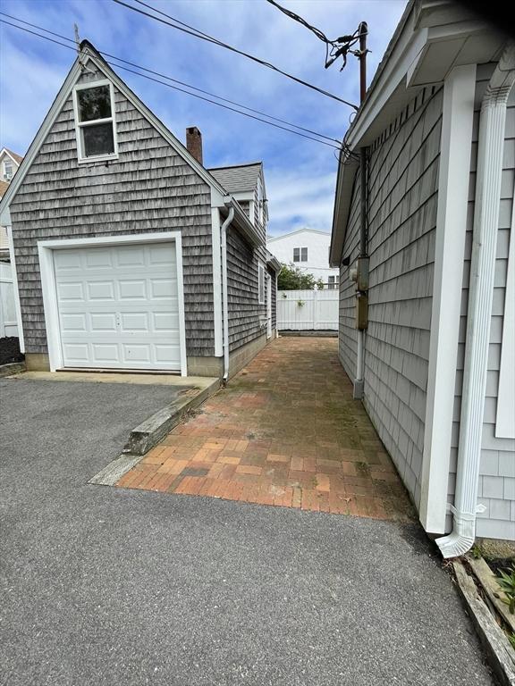 5 S Blvd, Wareham, MA 02558 - view of home's exterior featuring a chimney and driveway