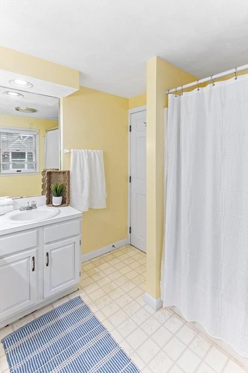 5 S Blvd, Wareham, MA 02558 - full bathroom featuring vanity, baseboards, tile patterned floors, and a shower with shower curtain