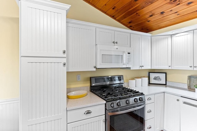 5 S Blvd, Wareham, MA 02558 - kitchen with white appliances, vaulted ceiling, wooden ceiling, white cabinets, and a wainscoted wall