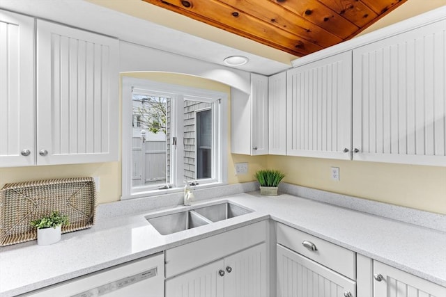 5 S Blvd, Wareham, MA 02558 - kitchen featuring a sink, dishwasher, and white cabinets