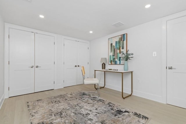 foyer entrance featuring light wood-type flooring