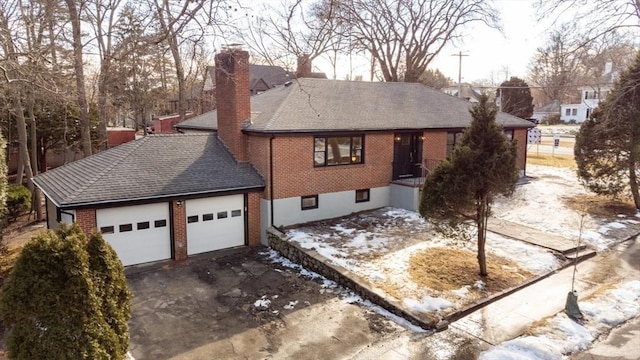 view of front of home with a garage