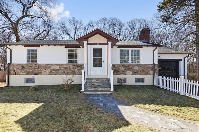 ranch-style home with fence, a chimney, entry steps, a front lawn, and stone siding