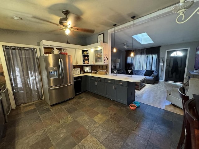 kitchen with gray cabinetry, kitchen peninsula, hanging light fixtures, ceiling fan, and stainless steel fridge with ice dispenser