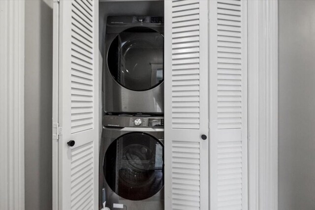 12 Salem St Unit 2, Haverhill, MA 01835 - clothes washing area featuring stacked washer / drying machine and laundry area