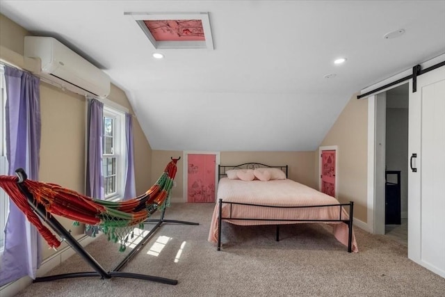 12 Salem St Unit 2, Haverhill, MA 01835 - bedroom with vaulted ceiling, carpet flooring, a wall mounted air conditioner, baseboards, and recessed lighting