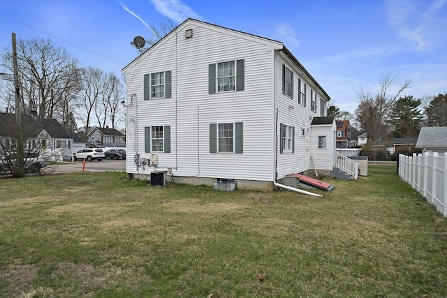 1 Chapin Cir, Randolph, MA 02368 - back of property featuring central air condition unit