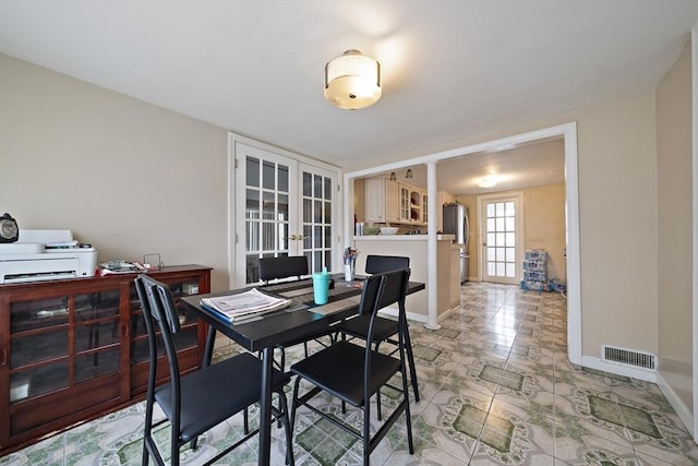 1 Chapin Cir, Randolph, MA 02368 - dining area featuring french doors and baseboards