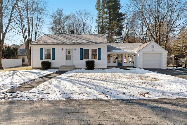 single story home with a garage