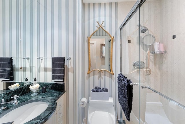 300 Boylston St Unit 517, Boston, MA 02116 - full bath with a stall shower, wallpapered walls, toilet, and vanity
