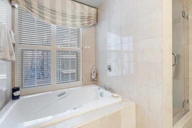 300 Boylston St Unit 517, Boston, MA 02116 - full bathroom with a stall shower, a bath, and tile walls